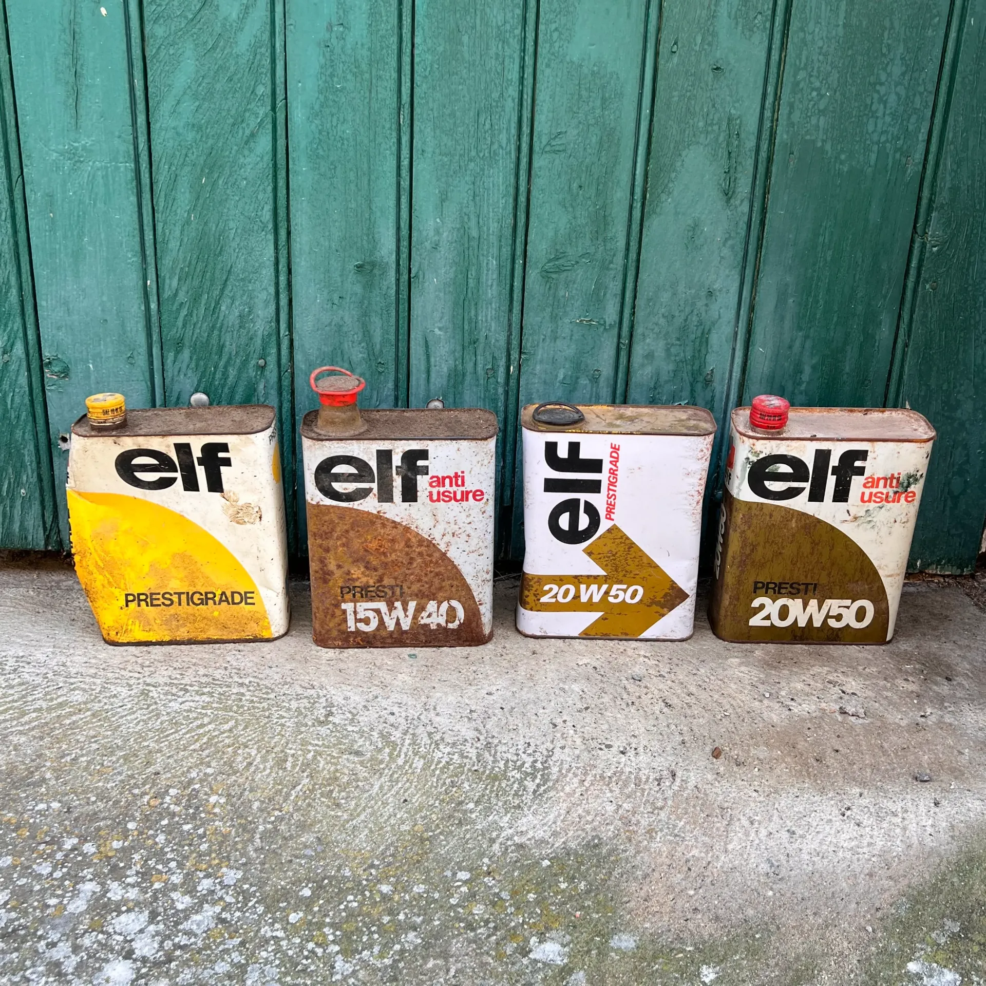 Lot de 4 bidons d’huile Elf